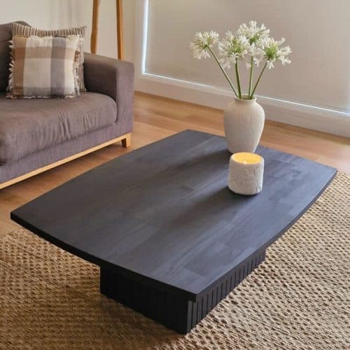 Contemporary black timber coffee table with clean lines and natural finish
